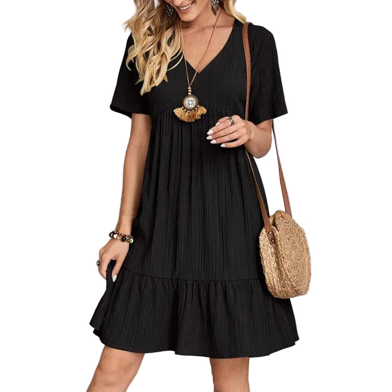 Alma Sol — vestido mini fluido con escote en V, mangas cortas y volantes