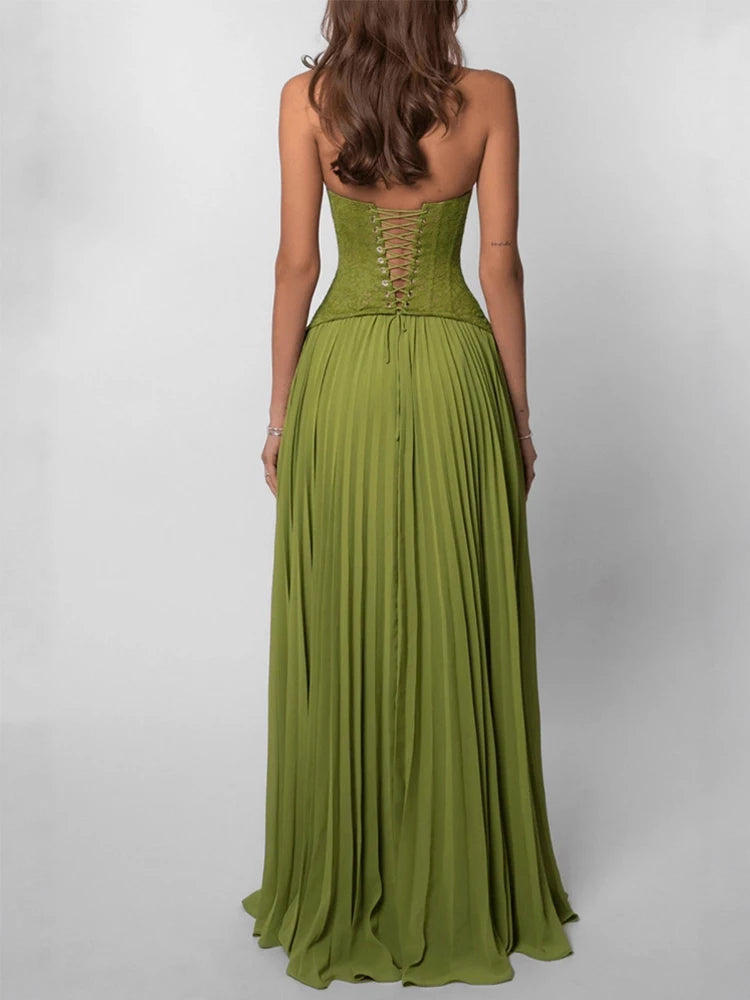 Iris Verde — vestido largo verde con corsé, espalda descubierta y silueta elegante plisada