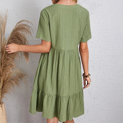 Alma Sol — vestido mini fluido con escote en V, mangas cortas y volantes