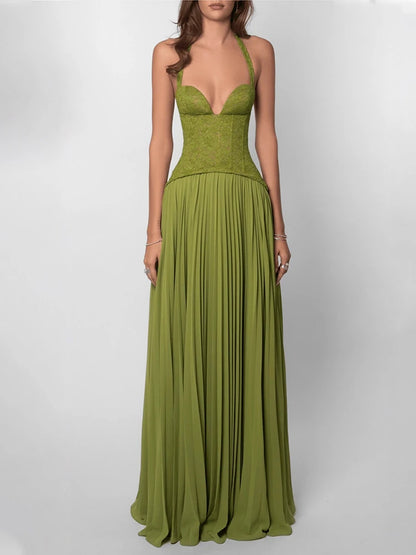 Iris Verde — vestido largo verde con corsé, espalda descubierta y silueta elegante plisada
