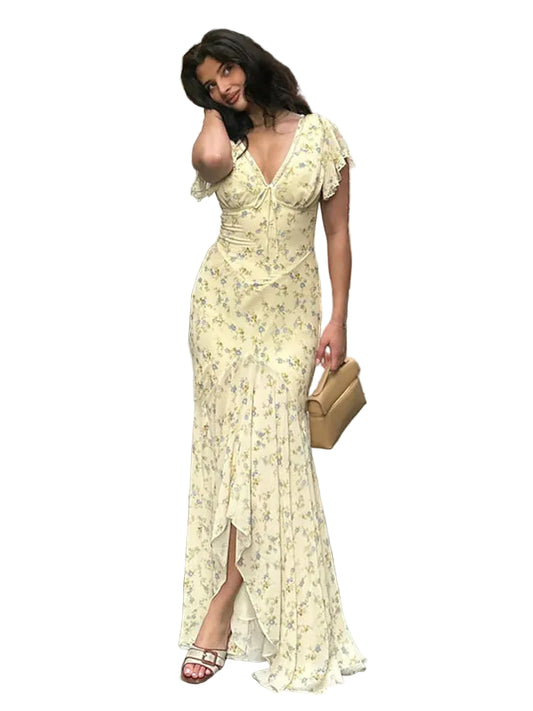Vera Sol — vestido estampado con escote en V, cintura alta y abertura lateral con volantes