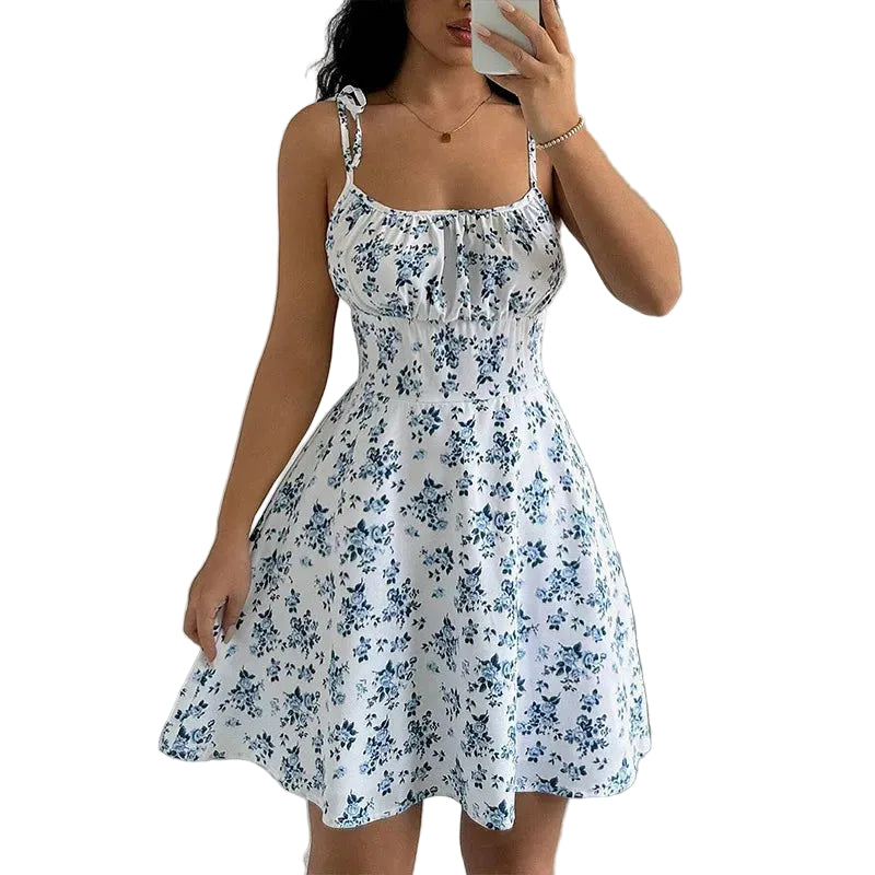 [EL 2 CON 35% OFF]Flor De La Brisa — Vestido corto floral con tirantes finos y una ligera caída veraniega